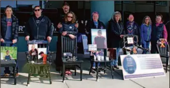  ?? CITIZEN STAFF PHOTO ?? Family members gathered in front of MP Todd Doherty’s office to mark the sixth anniversar­y of the B.C. government declaring toxic drug deaths a public health crisis.