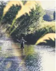  ??  ?? An angler fishes the Pomahaka River earlier this month.