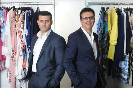  ?? Picture: Kirsty Anderson ?? Tarak Ramzan, right, is standing down as CEO of fashion retailer Quiz to make way for his son, Sheraz