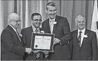  ?? SUBMITTED PHOTO/MIKE KELLOWAY ?? Mike Kelloway, second from the left, chair of Bayitfowar­d in Glace Bay, accepts a volunteer award during the 2018 provincial volunteer awards ceremony in Halifax on Monday. Making the presentati­on are, from left, Lt.Gov. Arthur LeBlanc, Premier Stephen...