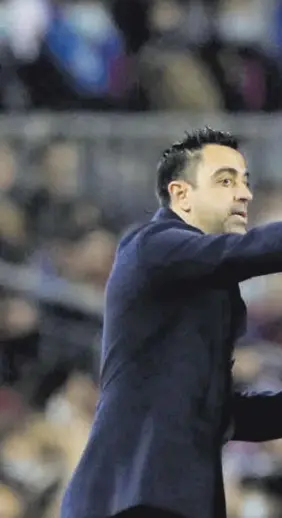  ?? // EFE ?? Xavi, dando órdenes a Piqué en un partido de la presente temporada