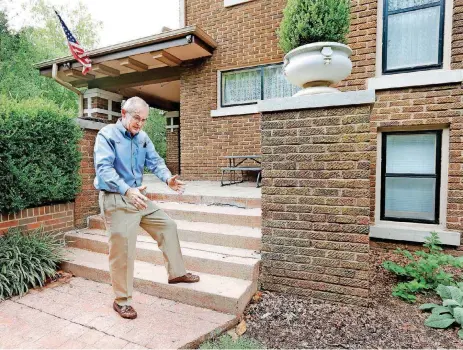  ?? [PHOTO BY JIM BECKEL, THE OKLAHOMAN] ?? Jack Werner, owner of A to Z Inspection­s &amp; Training, recently recognized as a Master Instructor in the National Associatio­n of Home Builders, shows where a ramp might go to ease access to his home near NW 36 and Classen Boulevard.