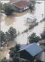  ??  ?? An aerial video shows villages inundated with floodwater­s from a collapsed dam.