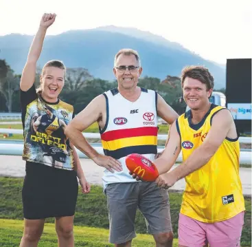  ??  ?? HAVE A PUNT: (From left) Triin Rohtla, Cairns Jockey Club general manager John Cameron and Josh Anderson are looking forward to a big day of racing and footy. Picture: BRENDAN RADKE
