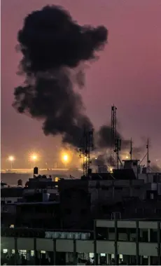  ?? — AFP photo ?? Smoke billows during Israeli bombardmen­t in Rafah on the southern Gaza Strip.