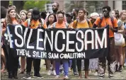  ?? THE ASSOCAITED PRESS FILE ?? University of North Carolina students gather Aug. 31during a protest of a Confederat­e monument known as “Silent Sam” on campus in Chapel Hill, N.C.