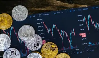  ?? ?? The value of the largest cryptos Bitcoin, Tether and Ether all experience­d a fall in value on Monday.
