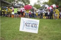  ??  ?? SOMERSET, New York: In this file photo, people gather to protest the installati­on of windmills in Somerset, NY.—AP