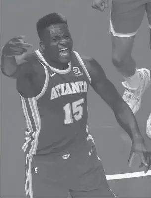  ?? BRYNNANDER­SON/AP ?? Atlanta Hawks center Clint Capela reacts after a play against the NewYork Knicks in Game 3 of their first-round playoff series Friday in Atlanta.