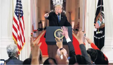  ?? PHOTO: REUTERS ?? President Donald Trump takes questions during a news conference at the White House following the midterm congressio­nal elections.