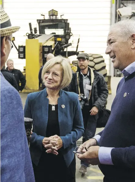  ?? JASON FRANSON/ THE CANADIAN PRESS ?? Chief Jim Boucher of Fort McKay, Alberta Premier Rachel Notley and Suncor CEO Steve Williams chat during the Suncor Fort Hills grand opening in Fort McMurray on Monday.