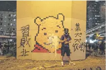  ??  ?? A Winnie the Pooh image mocking China’s leader Xi Jinping.