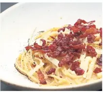  ??  ?? The crispy beef bacon in the creamy, rich carbonara adds texture to the dish.