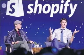  ??  ?? Prime Minister Justin Trudeau participat­es in an armchair discussion with Shopify CEO Tobias Lutke in Toronto on Tuesday.