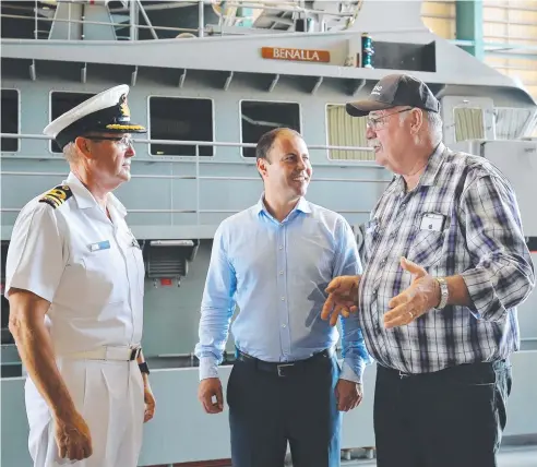  ??  ?? SUPPORT: Federal Treasurer Josh Frydenberg and Member for Leichhardt Warren Entsch on a visit to the HMAS Cairns naval base in 2016 with the then Captain of HMAS Cairns, Commander Carl Capper. Picture: BRENDAN RADKE