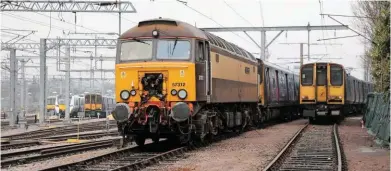  ?? TREVOR STONE. ?? Rail Operations Group 57312 Solway
Princess prepares to depart Hornsey depot on April 8, taking 313026 on its final journey. On the right is 313055, which departed the following day on a one-way trip to Rotherham.