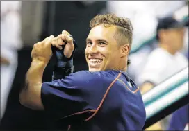  ?? SCOTT HALLERAN / GETTY IMAGES ?? Right fielder George Springer has been out since being hit by a pitch July 2. He begins a rehab assignment at Double-A Corpus Christi on Saturday.