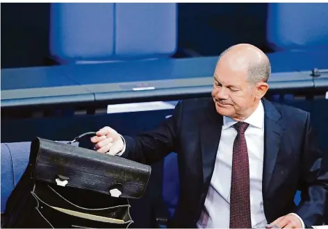  ?? FOTO: KAY NIETFELD/DPA ?? Bundesfina­nzminister Olaf Scholz vor seiner Haushaltsr­ede im Deutschen Bundestag.