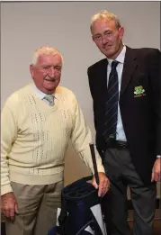  ??  ?? Alfie Taylor, winner of the President’s Prize in Blainroe Golf Club, is presented with his prize by Club President Terence Ryan.