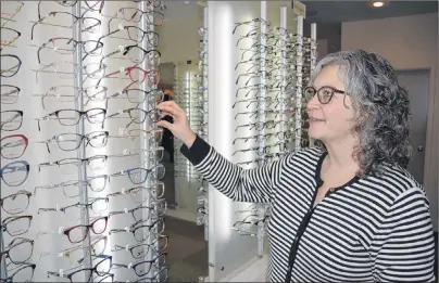  ?? DAVE STEWART/THE GUARDIAN ?? Dr. Catherine Arsenault, an optician with Family Vision Centre in Charlottet­own, says Health P.E.I. is now covering eye exams for kindergart­en-aged children, appointmen­ts to look at patients suffering from red or dry eyes and a portion of the screening...