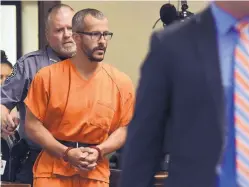  ?? JOSHUA POLSON/THE GREELY TRIBUNE ?? Christophe­r Watts, seen here being escorted into the courtroom before his bond hearing in August, pleaded guilty Tuesday to each of nine charges against him. He will avoid the death penalty as part of his plea deal.