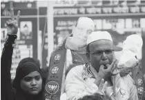  ??  ?? Muslims BJP workers celebrate the party’s victory in Lok Sabha polls in Lucknow —