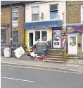  ??  ?? Police visited the flat, which is above a shop, following the discovery of a cannabis factory