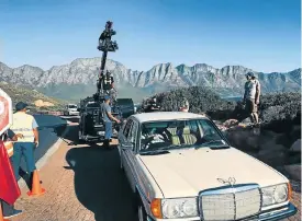  ??  ?? Christophe­r White returns to Chapman’s Peak Drive 30 years after he plummeted down the side in a similar Mercedes.