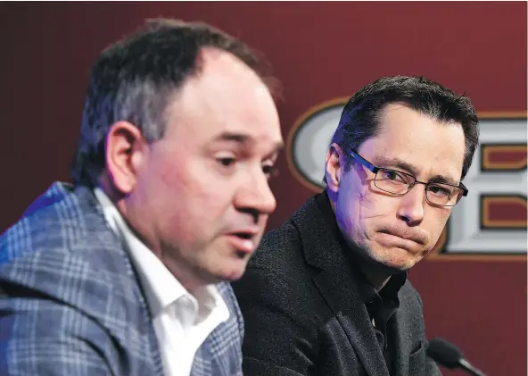  ?? —THE CANADIAN PRESS ?? Senators coach Guy Boucher, right, and general manager Pierre Dorion discuss next year’s campaign on Monday.