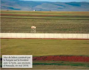  ??  ?? Mur de béton construit par la Turquie sur la frontière avec la Syrie, aux environs d’amouda, en mai 2018.