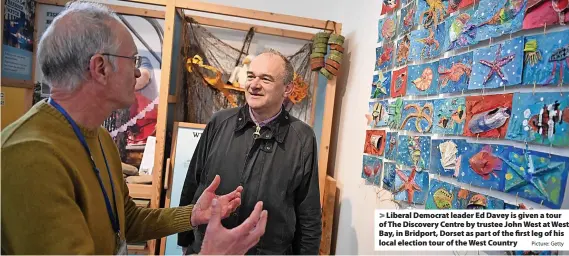  ?? Picture: Getty ?? Liberal Democrat leader Ed Davey is given a tour of The Discovery Centre by trustee John West at West Bay, in Bridport, Dorset as part of the first leg of his local election tour of the West Country