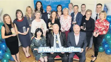  ??  ?? Winners Many council workers were rewarded for their efforts. They are pictured with chief executive Lorraine McMillan, front left, and Provost Jim Fletcher, centre