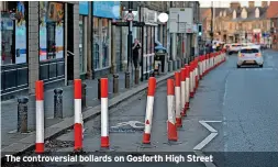  ?? ?? The controvers­ial bollards on Gosforth High Street