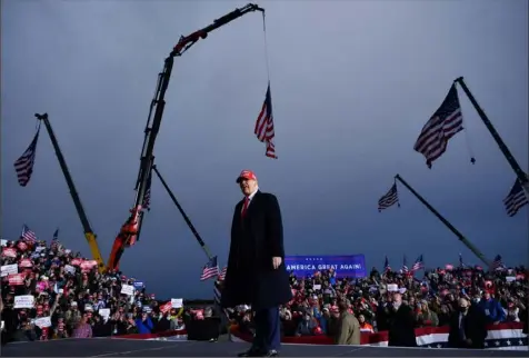  ?? Mandel Ngan/AFP via Getty Images ?? President Donald Trump shouts to the crowd Saturday during a rally at Muskegon County Airport in Muskegon, Mich.