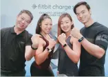  ??  ?? (from left) Louis Lye, Fitbit's country manager of SEA, Hong Kong and Taiwan with fitness celebritie­s Linora Low, Joanna Soh and Kit Mah.