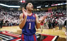  ?? BRAD TOLLEFSON — THE ASSOCIATED PRESS ?? Kansas’ Devon Dotson (1) celebrates after March 7game against Texas Tech in Lubbock, Texas.