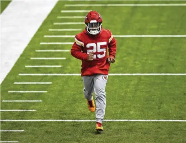  ?? AP ?? Chiefs running back Clyde Edwards-helaire runs during a workout Jan. 26. Edwards-helaire, who has been out since sustaining a high ankle sprain during a win over the Chargers on Nov. 20, was activated off of injured reserve Monday. Edwards-helaire has run 71 times for 302 yards and 3 TDS and caught 17 passes for 151 yards and 3 TDS this season.