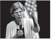  ?? CHARLES KRUPA/AP ?? A report says Harvard University’s decision to hire Sen. Elizabeth Warren, D-Mass., was not based on her heritage.