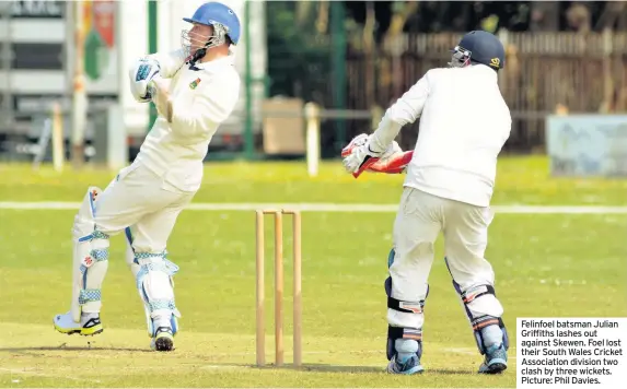  ?? Picture: Phil Davies. ?? Felinfoel batsman Julian Griffiths lashes out against Skewen. Foel lost their South Wales Cricket Associatio­n division two clash by three wickets.