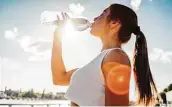  ?? Getty Images ?? How much water are you actually supposed to drink in a day? It varies from person to person.