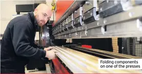  ??  ?? Folding components on one of the presses