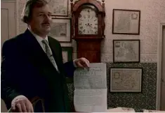  ??  ?? LEFT: Jan Bondeson holding up one of Angerstein’s posters in a still from the film The London Monster.