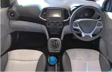  ??  ?? Interiors of the new Santro looks premium with the dual-tone beigeon-black themed dashboard