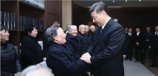  ??  ?? Chinese President Xi Jinping (right) meets with some survivors of the Nanjing Massacre and relatives of foreign friends who contribute­d to the victory of the Chinese People’s War of Resistance Against the Japanese, after attending a state memorial...