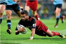  ?? PHOTOSPORT ?? Richie Mo’unga dots down for a try against the Waratahs in 2016.