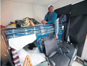  ?? R.J. JOHNSTON TORONTO STAR ?? After fleeing Nigeria last October, Joseph Nwaeze has been living in a 60-foot trailer he shares with at least a dozen other men in north Vaughan. The property is owned by evangelica­l church Miracle Arena for All Nations, which has been housing asylum seekers since last summer.