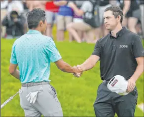  ?? Darron Cummings The Associated Press ?? Patrick Cantlay, right, greets Collin Morikawa after defeating the Las Vegas resident in a playoff Sunday at the Memorial.