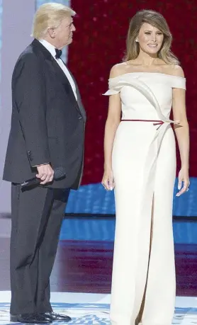  ??  ?? Apple of The Donald’s eye: Melania in the inaugurati­on ball gown she co-designed with former Carolina Herrera creative director Hervé Pierre