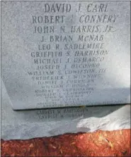  ?? PHOTO PROVIDED ?? The names of Vietnam veterans Garrett Hartshorn, U.S. Coast Guard (1967-1971) and Garrett Schnapp (U.S. Navy (1965- 1969), U.S. Coast Guard (1972-1977) were added to a memorial in Green Island.