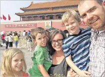  ?? CONTRIBUTE­D ?? Austin writer Tsh Oxenreider, center, wrote “At Home in the World: Reflection­s on Belonging While Wandering the Globe” about her yearlong trip with her family that took them from China to London and everywhere in between.